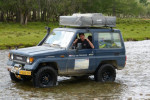 De Toybota met Roy in de rivier 